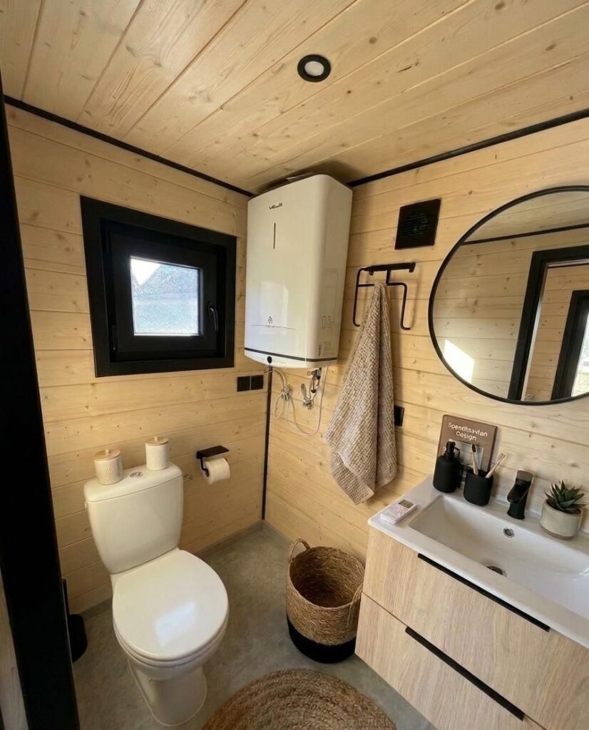 Das große Badezimmer im mobile haus „Mia“ von Tina House Design